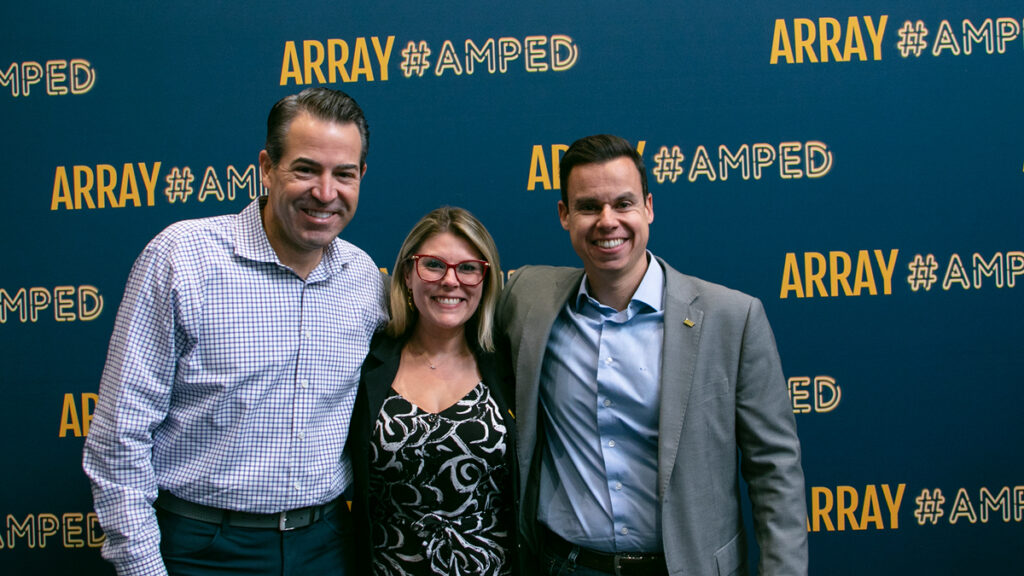 Camila Fernanda de Carvalho (center) with Bill Curtis, Senior Director of Sales Excellence (left), and Vinicius Gibrail, General Director ARRAY Latin America, at the inaugural ARRAY Global Leadership Conference.